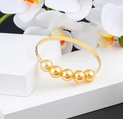 HAMILTON GOLD PLATED BANGLES