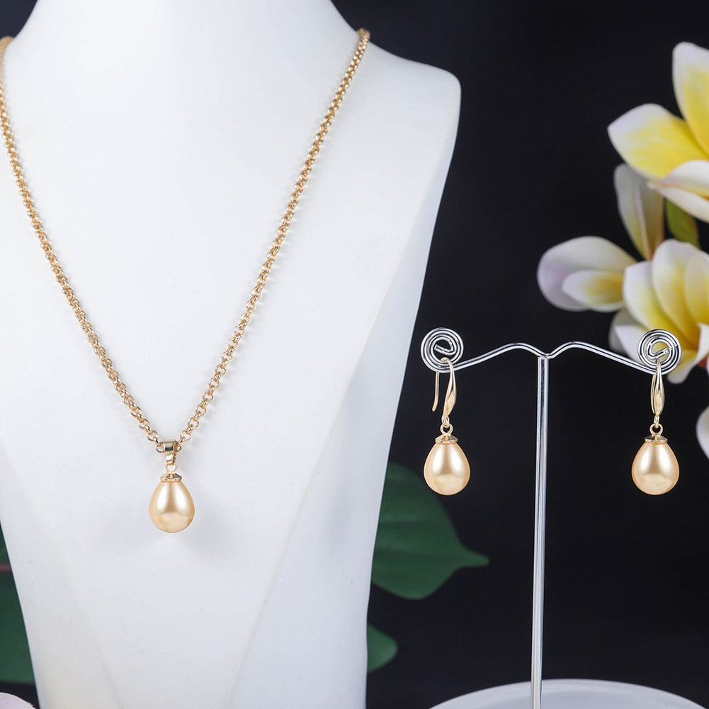 GOLD PLATED SHELL PEARL PENDANTS/NECKLACES WITH MATCHING EARRINGS